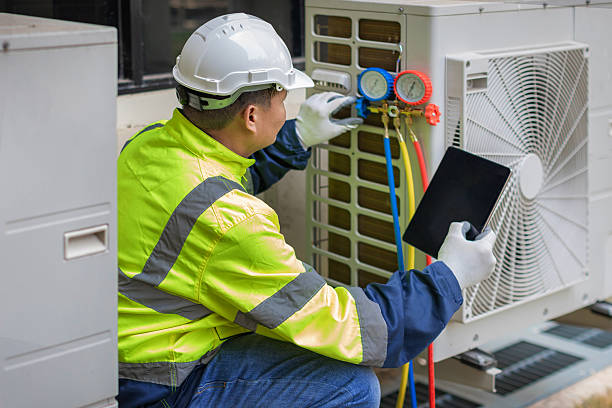 Professional Heat Pump Repair technician working in Valera, TX
